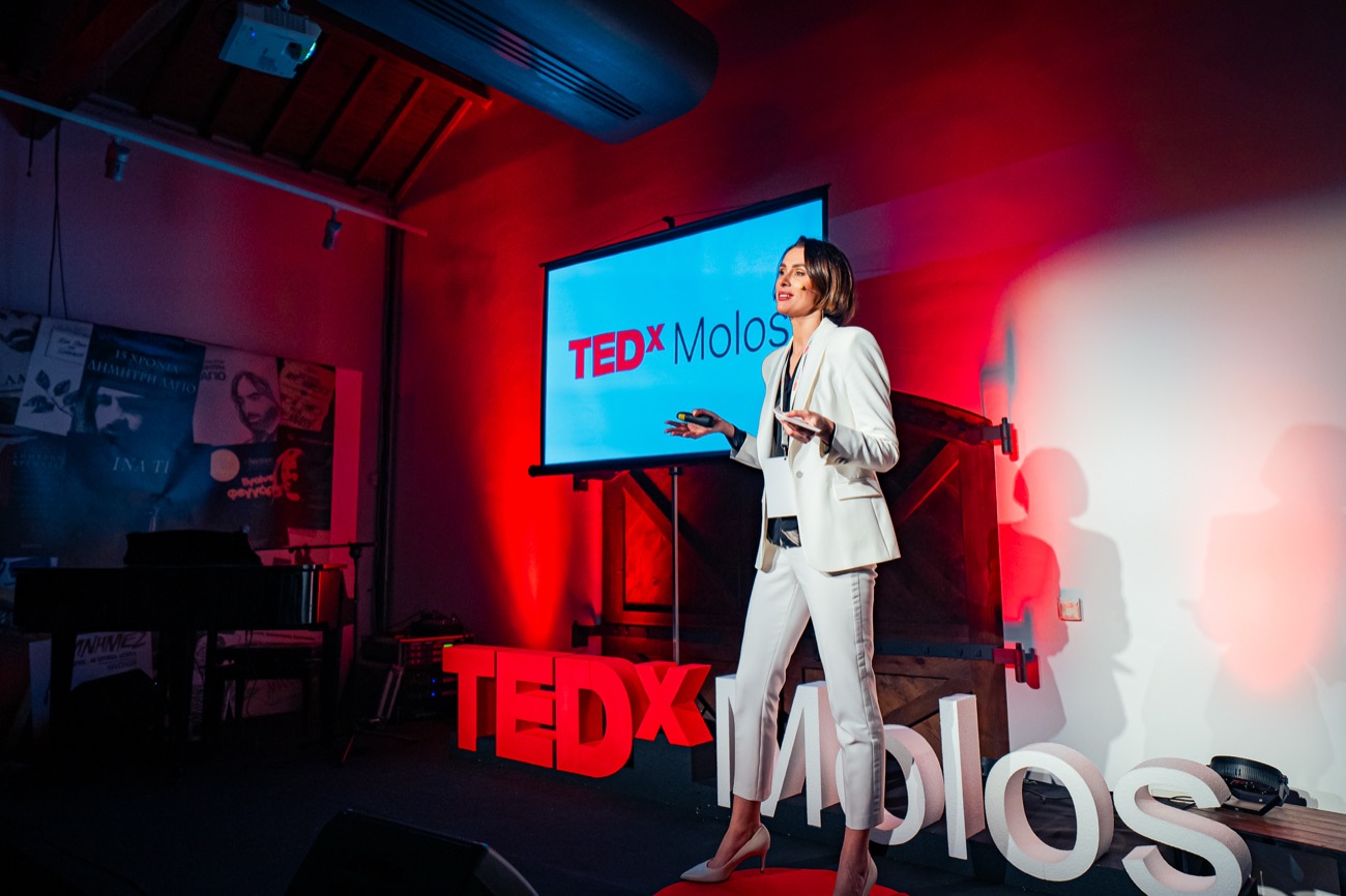 Natallia speaking on the TEDx stage